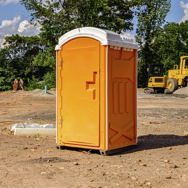 how often are the porta potties cleaned and serviced during a rental period in Rowena